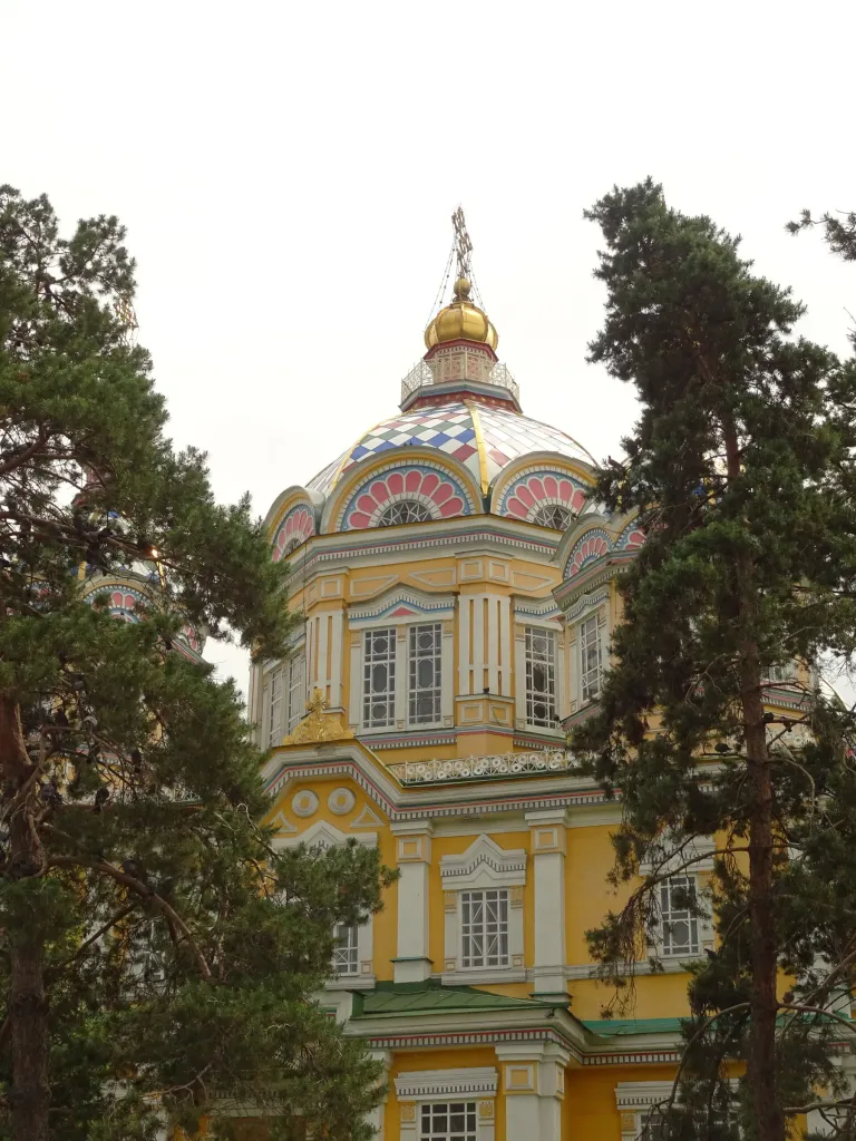 Colourful domes and facade of Ascension Cathedral in Almaty