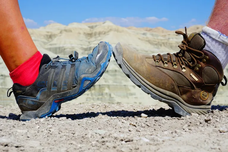 Hiking shoes with pale desert hills in the background
