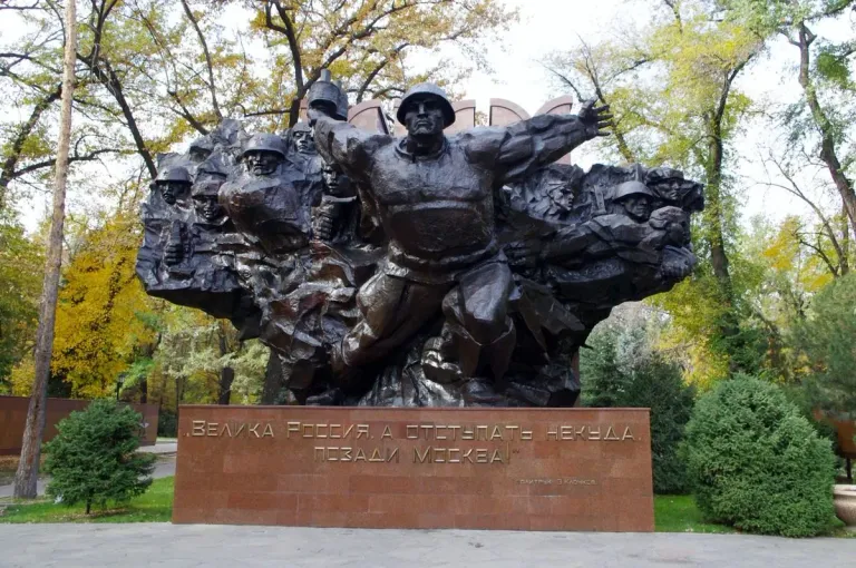 Monument of Glory among autumn trees in Almaty