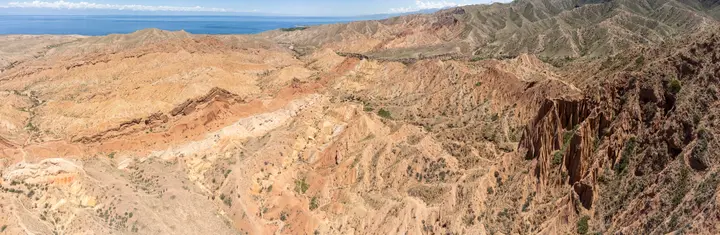 Aerial panorama of the sculpted hills of Skazka Canyon