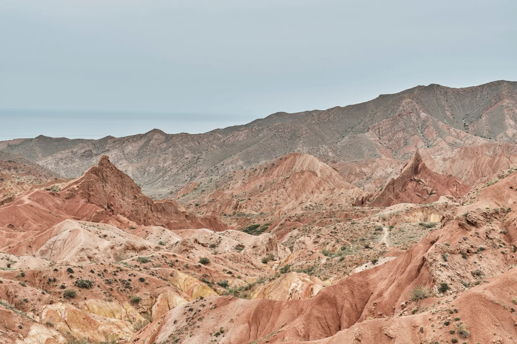 Layered cliffs and dry gullies in Kyrgyzstan’s Fairytale Canyon