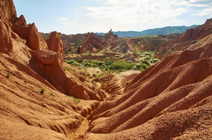Red sandstone formations in Fairy Tale Canyon near Issyk-Kul